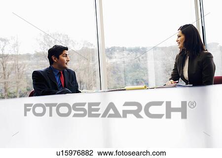 Stock Image -  business office sitting conference table in 30-34. Fotosearch