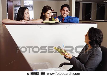 Stock Photograph -  business people hand talking over cubicle 25-29. Fotosearch
