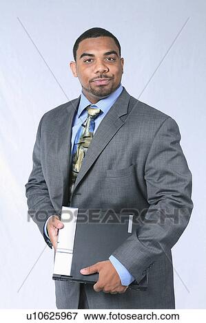 business people man person face laptop in suit View Large Photo Image Stock Photo - business people man person face laptop in suit. Fotosearch