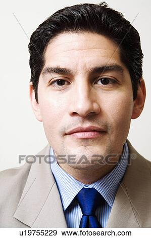 Stock Photo -  business portrait 30-34 years black hair suit. Fotosearch