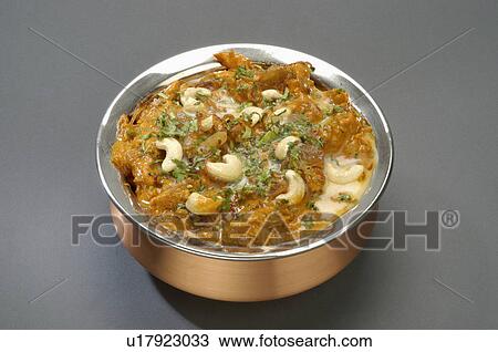 Stock Image -  butter chicken masala meat dishes foods curries. Fotosearch