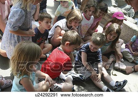 butterfly girl children kids group sitting boy View Large Photo Image Stock Image - butterfly girl children kids group sitting boy. Fotosearch