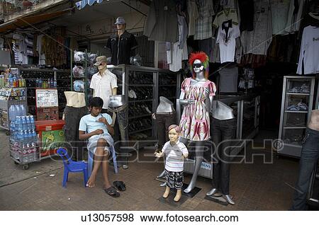 Stock Photo -  cambodia clothes shop western style mannequins. Fotosearch