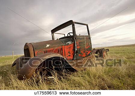 Stock Image -  car retro vintage antique old in field . Fotosearch