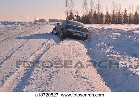 car winter image in ditch snow covered road auto View Large Photo Image Stock Photo - car winter image in ditch snow covered road auto. Fotosearch