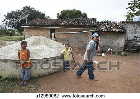 child children brazil farmer in front rainwater View Large Photo Image Stock Image - child children brazil farmer in front rainwater . Fotosearch
