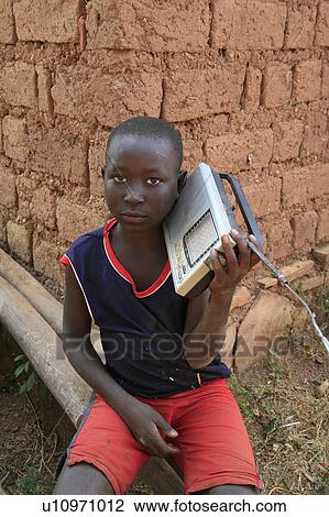 child children burundi boy radio gitera africa View Large Photo Image Stock Image - child children burundi boy radio gitera africa . Fotosearch
