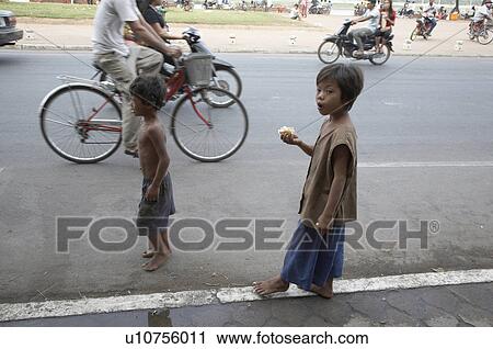 Stock Image -  child children cambodia street phnom penh asia . Fotosearch