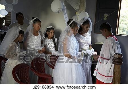 Picture -  child children guatemala catholic first mass el . Fotosearch