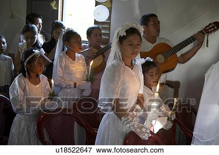 Stock Photo -  child children guatemala catholic first mass el . Fotosearch