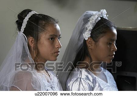 Stock Photograph -  child children guatemala catholic first mass el . Fotosearch