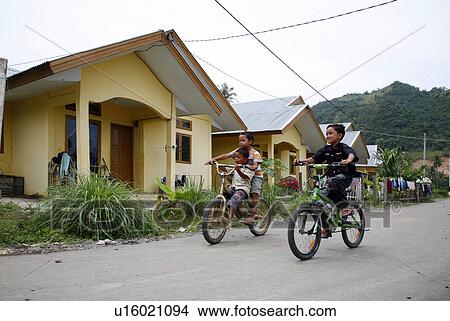 child children indonesia amalul friend bicycles View Large Photo Image Picture - child children indonesia amalul friend bicycles . Fotosearch