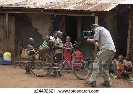 Stock Image -  child children uganda tony wilson kayunga use . Fotosearch