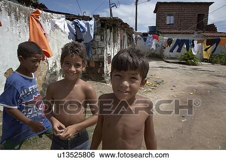 Stock Photograph -  child football children brazil favela balcao . Fotosearch