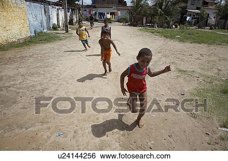 Stock Photograph -  child football children brazil favela balcao . Fotosearch
