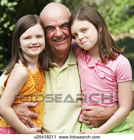 Stock Image - child man senior smiling in park 10-11 years . Fotosearch