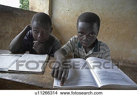 Picture -  child school children uganda kyayaaye roman . Fotosearch