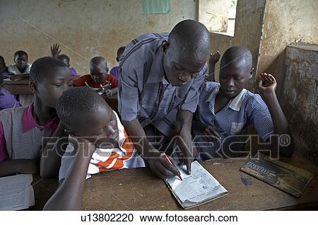 child school children uganda kyayaaye roman View Large Photo Image Stock Image - child school children uganda kyayaaye roman . Fotosearch