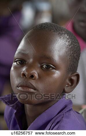 Stock Photo -  child school face children uganda kyayaaye roman . Fotosearch