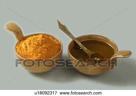 chilly powder oil table top turmeric display View Large Photo Image Stock Photo - chilly powder oil table top turmeric display. Fotosearch