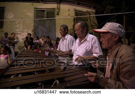 Stock Photo -  christmas guatemala posada flores el peten men . Fotosearch