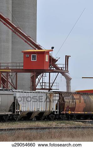 Stock Image -  close up image loading rail cars cereal grain. Fotosearch