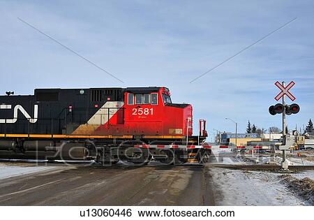 close up image train engine crossing level main View Large Photo Image Stock Photograph - close up image train engine crossing level main. Fotosearch