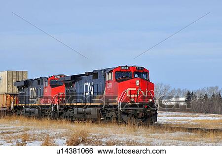 Stock Photograph -  close up image two train engines pulling rail. Fotosearch