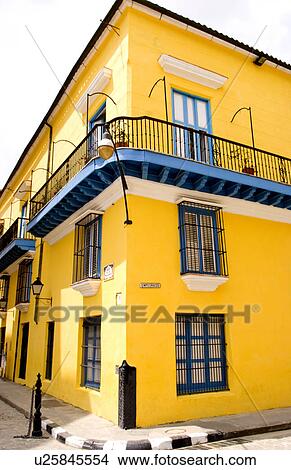 colorful yellow building in old havana cuba View Large Photo Image Picture - colorful yellow building in old havana cuba. Fotosearch