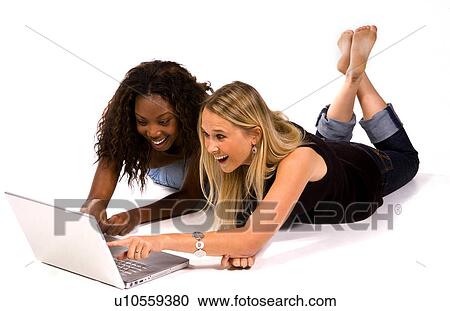 computer internet laptop women two young aged View Large Photo Image Stock Image - computer internet laptop women two young aged. Fotosearch
