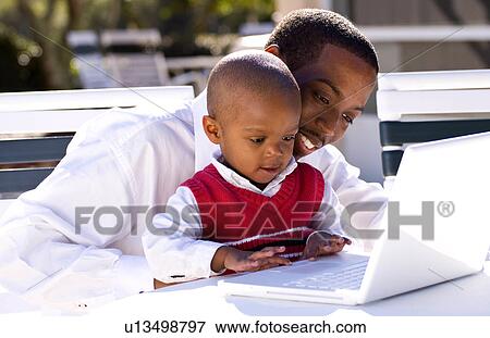 computer love home attractive black african boy View Large Photo Image Stock Photo - computer love home attractive black african boy. Fotosearch