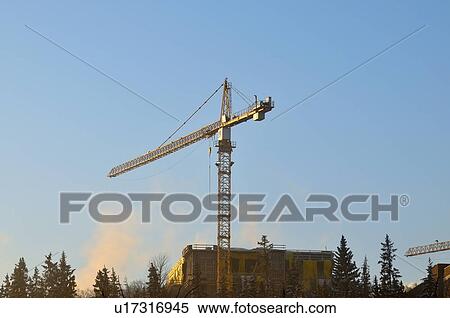 Stock Photography -  construction horizontal image large tower crane. Fotosearch