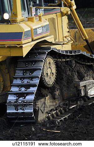 Stock Image -  construction rear side view large bull dozer. Fotosearch