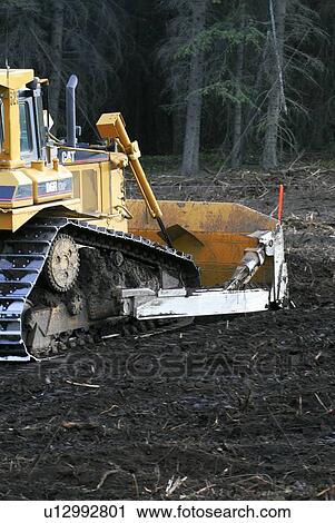 construction rear view large bull dozer pushing View Large Photo Image Stock Image - construction rear view large bull dozer pushing. Fotosearch