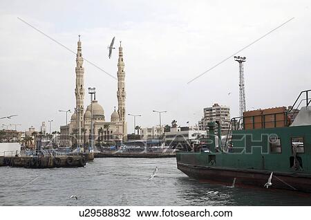 Stock Image -  egypt crossing suez canal in port said north . Fotosearch