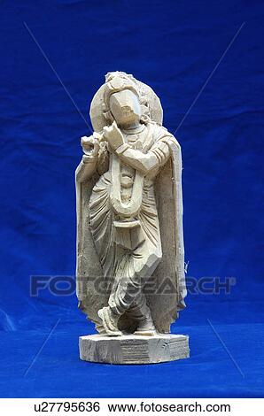 Stock Photograph -  face art wood carving god carvings handicraft. Fotosearch
