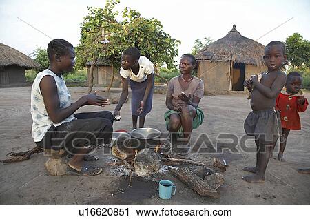 family baby south sudan early morning scene yei View Large Photo Image Stock Image - family baby south sudan early morning scene yei . Fotosearch