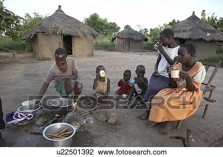 family baby south sudan early morning scene yei View Large Photo Image Stock Image - family baby south sudan early morning scene yei . Fotosearch