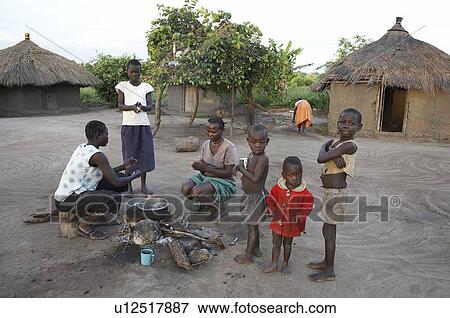family baby south sudan early morning scene yei View Large Photo Image Stock Photo - family baby south sudan early morning scene yei . Fotosearch