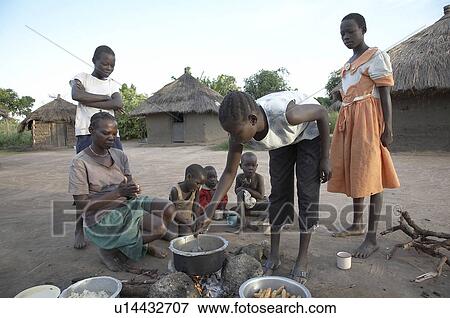 Stock Photo -  family baby south sudan early morning scene yei . Fotosearch