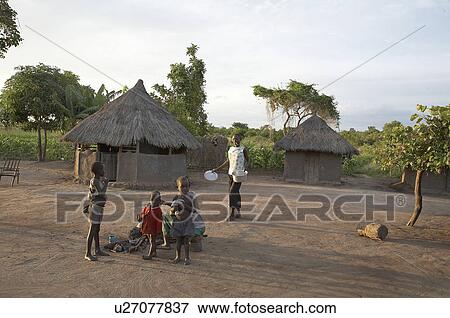 family baby south sudan early morning scene yei View Large Photo Image Stock Photo - family baby south sudan early morning scene yei . Fotosearch