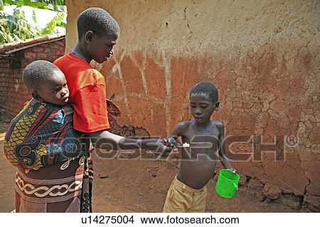 Picture -  family child children burundi speciose ciza . Fotosearch