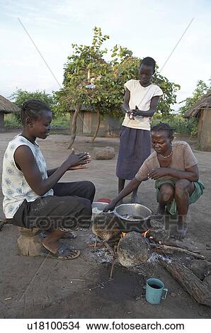 family food fire south sudan early morning scene View Large Photo Image Picture - family food fire south sudan early morning scene . Fotosearch