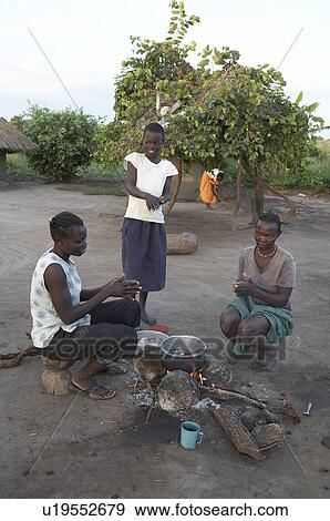 family food fire south sudan early morning scene View Large Photo Image Stock Photo - family food fire south sudan early morning scene . Fotosearch