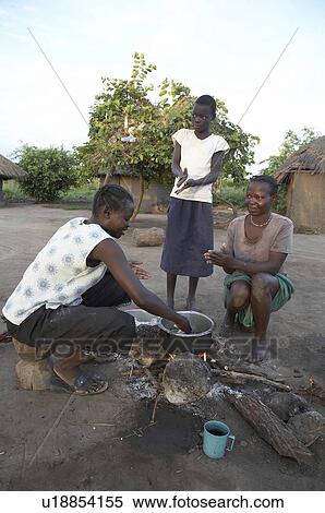family food fire south sudan early morning scene View Large Photo Image Stock Photography - family food fire south sudan early morning scene . Fotosearch