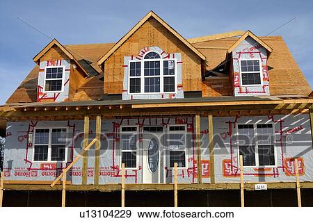 Stock Photo -  family house construction home exterior image. Fotosearch