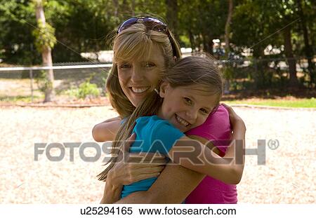 Stock Photography -  family love child kid mother daughter hugging . Fotosearch