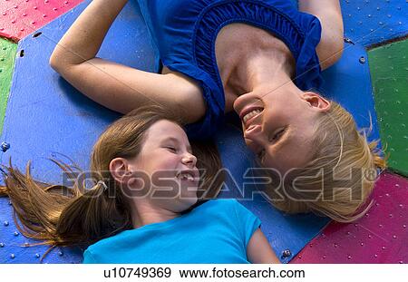 Stock Photo -  family mother daughter relaxing together . Fotosearch