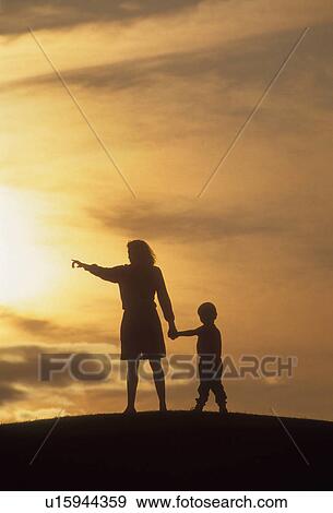 Stock Photo -  family people hand child mother son hilltop 5-6. Fotosearch