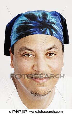 Stock Photo -  fashion man portrait mature wearing bandana 40-44 years. Fotosearch